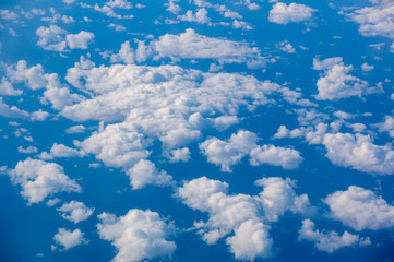 white clouds on blue sky top view