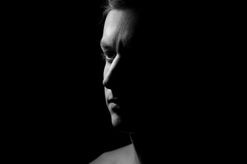 black and white dramatic portrait of a guy