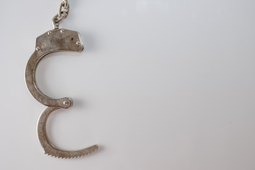 steel metal Handcuffs on  white background isolate