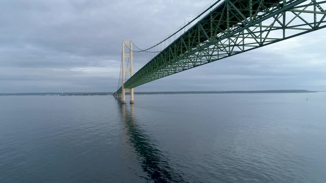 Aerial footage of Michigan's  Mackinac Bridge "Mighty Mac"at sunset.