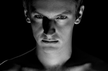 black and white dramatic portrait of a guy