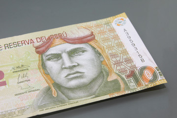Peru Money, Currency of Peru,Ten Nuevos Soles close-up on dark background. Cash money