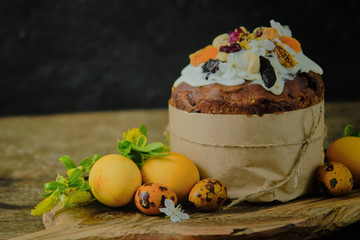 Easter cake and eggs. Still life on a dark background
