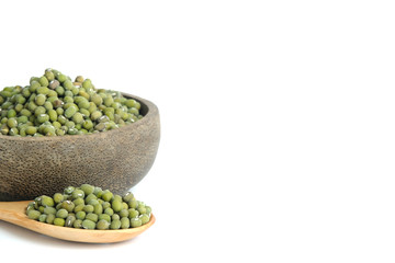 raw green mung seed on wooden spoon and bowl isolated on a white background