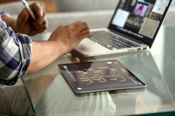 Online mathematic class via video call and tablet. Algebra remote schooling due to COVID-19 quarantine.