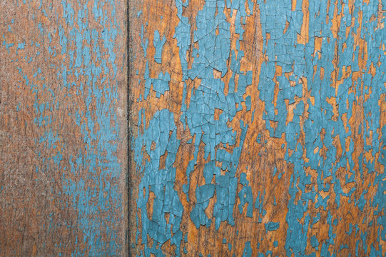 Wooden texture with cracked paint. shabby wood background © maxkolmeto