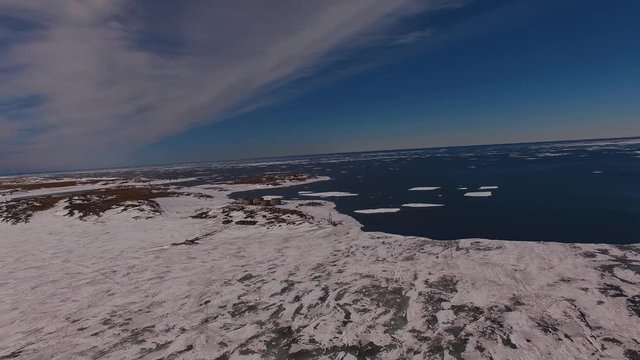 Aerial view of the summer pore melting ice of the Kara Sea off the coast of Dixon in the Arctic