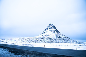 snow covered mountain in Iceland Kirkjufell