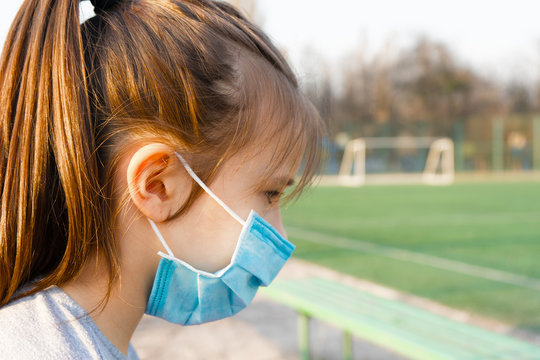 Masked Child - Protection Against Covid Virus. Girl Wearing Mask Protect Pm2.5.