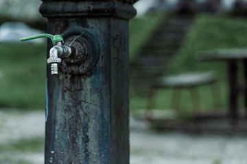 Old cast iron drinking fountain in a deserted park