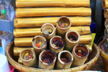 Khao Lam or glutinous rice roasted in bamboo joints famouse dessert in Thailand