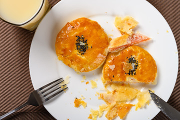 top view traditional chinese seasame biscuit with cup of soy milk