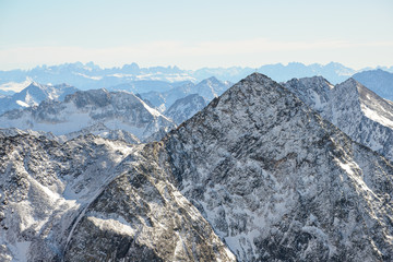 View of mountains from Tirol, with a cross on top of the nearest one