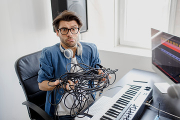 Doesn't know what to do with wires and cords and cables. DJ in broadcasting studio. music producer...