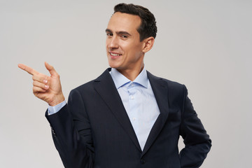 young businessman pointing at you