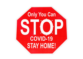Stop sign isolated on white with message Only You can STOP COVID-19 STAY HOME! Corona Virus pandemic sweeping across the United States and the world, killing millions