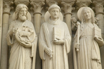 Fototapeta na wymiar Sculpture outside the Notre Dame Cathedral, Paris, France