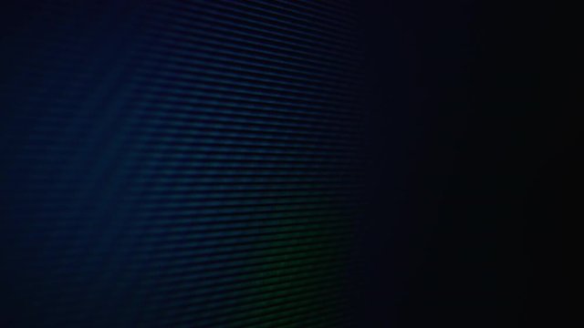 CU, macro view: bright juicy blue colors on LCD screen of modern TV with different glowing pixels extreme closeup