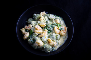 Creamy cheesy sauce spinach gnocchi with shrimp