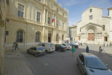 Fototapeta na wymiar The church of St. Trophime (building w/brown doors), Arles, France