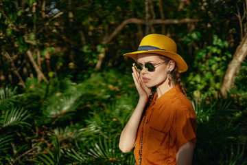 young woman in a hat