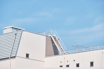 factory building with blue sky