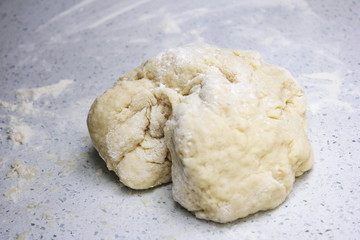 Close-up of a piece of dough. Cooking concept.