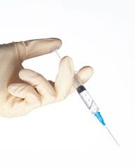 hand in latex glove hold medicine syringe isolated on white background