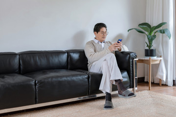 An Asian male wearing