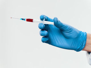 hand holding syringe