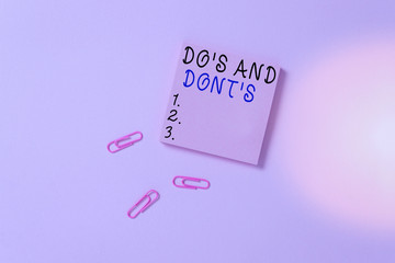 Conceptual hand writing showing Do S And Dont S. Concept meaning Rules or customs concerning some...