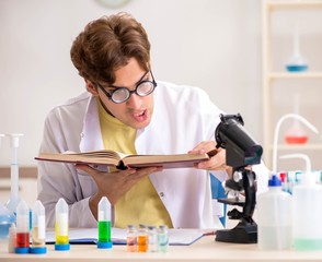 Funny crazy chemist doing experiments and tests
