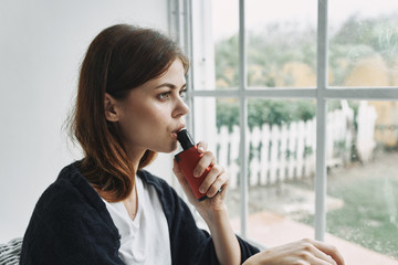 young woman drinking coffee