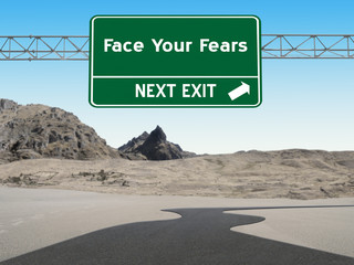 Face Your Fears sign for courage concept.
