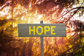 Hope sign for positive future outcome and hopefulness concept.