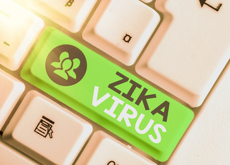 Conceptual hand writing showing Zika Virus. Concept meaning caused by a virus transmitted primarily...
