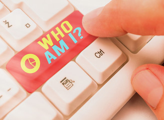 Conceptual hand writing showing Who Am I Question. Concept meaning asking about self identity or...