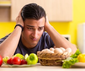 Young man in dieting and healthy eating concept