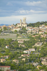 Fototapeta premium Town of La Turbie with Trophee des Alpes and church, France