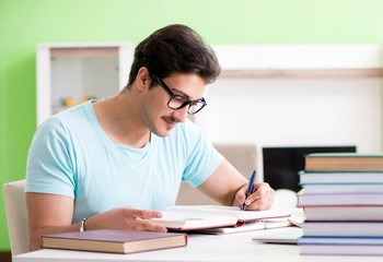 Student preparing for university exams at home