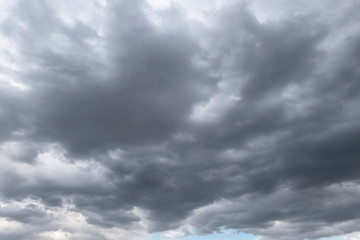 Fototapeta premium Dark storm clouds before rain used for climate background. Clouds become dark gray before raining.