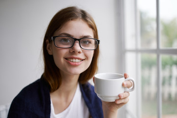 young woman drinking coffee