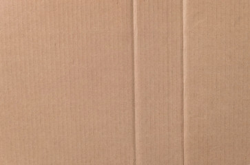 Fototapeta premium Brown cardboard sheet texture background. Texture of recycle paper box in old vintage pattern background.