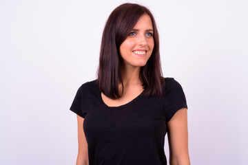Fototapeta premium Portrait of happy young beautiful woman thinking