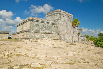 Mayan ruins of Ruinas de Tulum (Tulum Ruins) in Quintana Roo, Yucatan Peninsula, Mexico. El Castillo is pictured in the background.