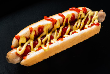hot dog on the black background
