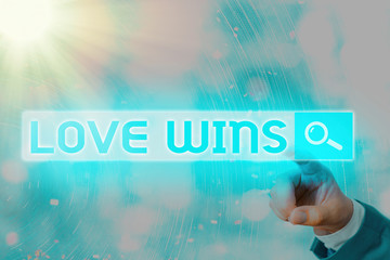 Writing note showing Love Wins. Business concept for used to celebrate or commemorate the victory...