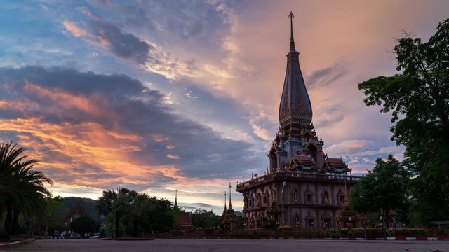 Time lapse video Wat chalong or chalong temple landmark of Phuket and is a popular tourist attraction with dramatic sky background and rain cloud movement wide angle shot Panorama shot in Apple Prores