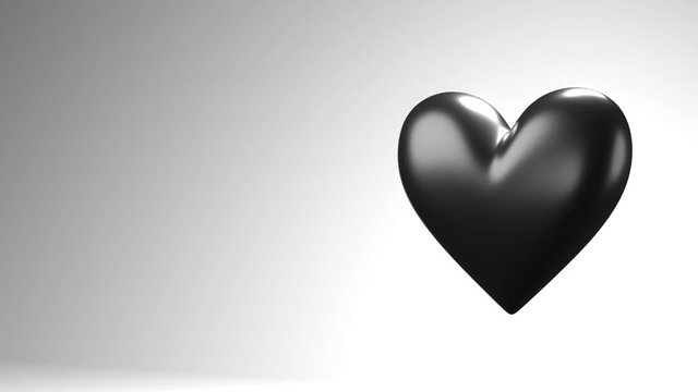 Black broken heart objects in white text space.
Heart shape object shattered into pieces.