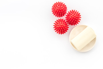 Coronavirus and soap on white background top-down copy space